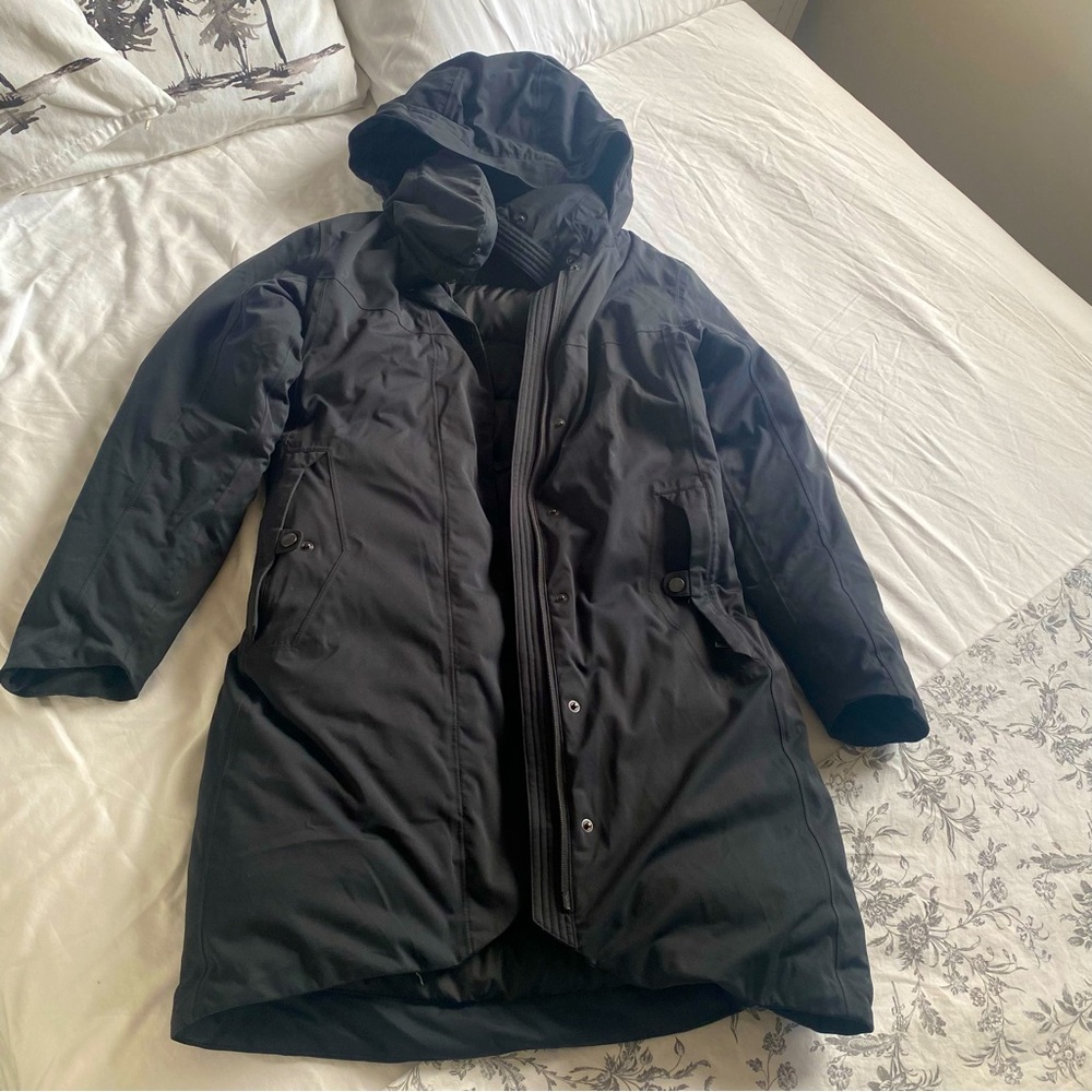 Black long coat size S, Nau brand.